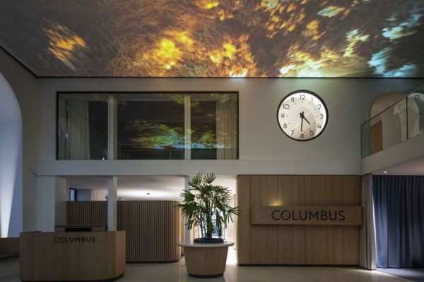 A glimpse into the new reception area with a unique ceiling projection